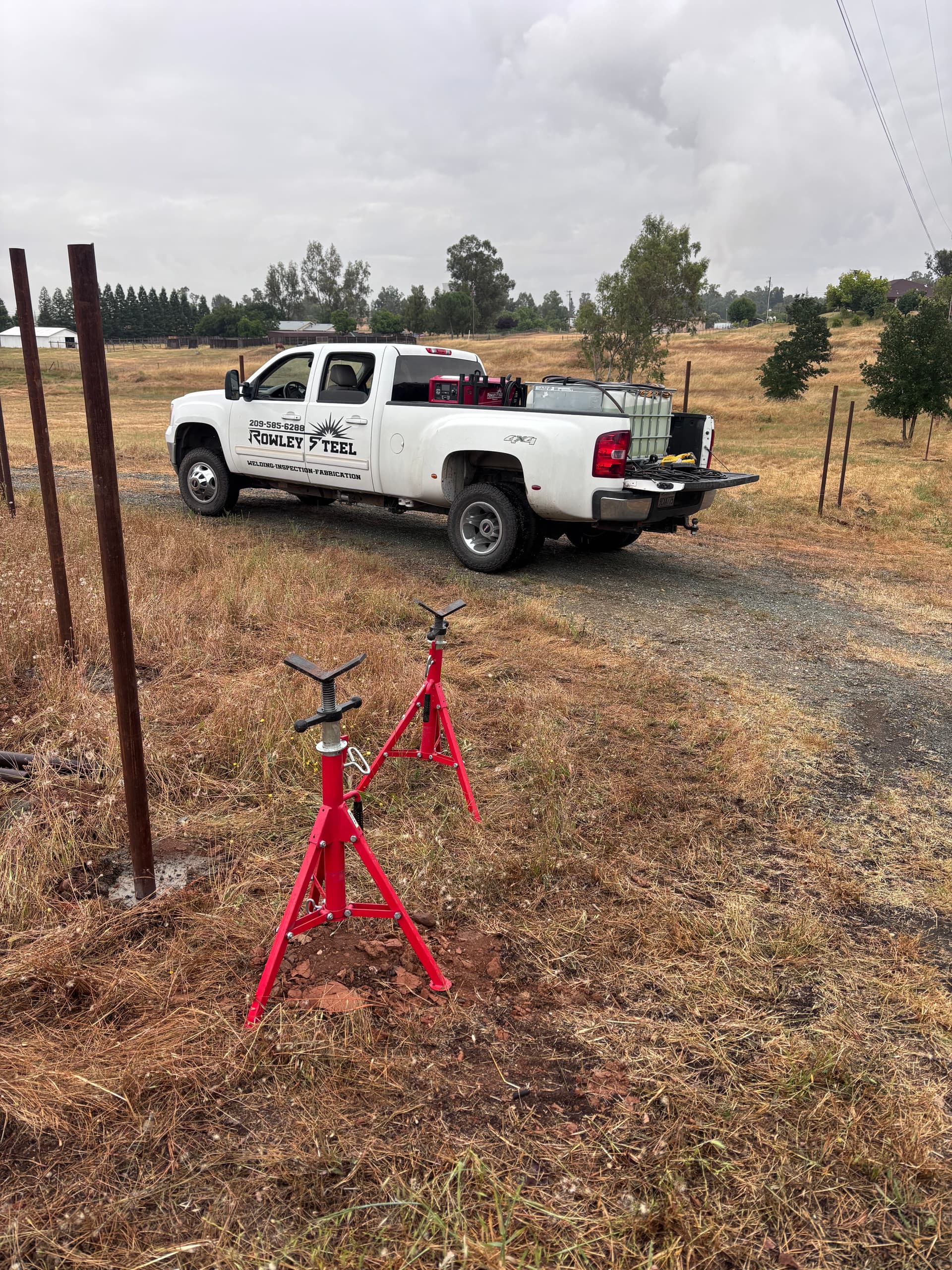 Pipe Fence Installation in the Rain - We Don't Stop for Weather