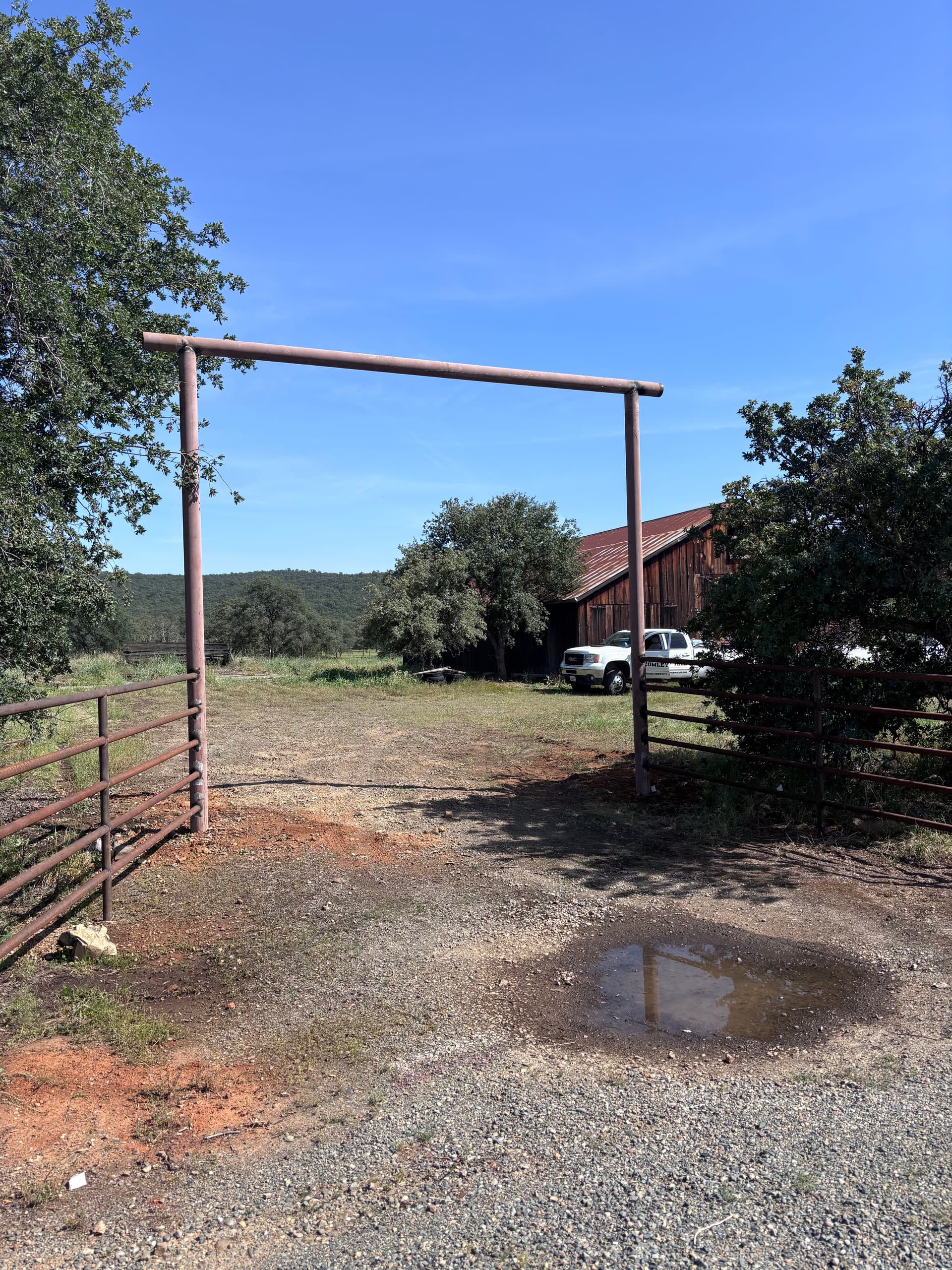 Gallery photos for Overhead Steel Gate Frame Welded and Ready Before Fire Season: Image #1